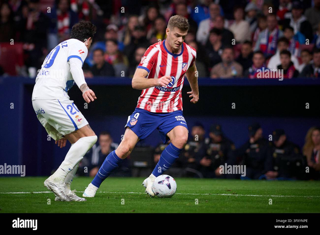 Atletico de Madrid’s Alexander Sorloth (r) and RC Deportivo de A Coruna ...