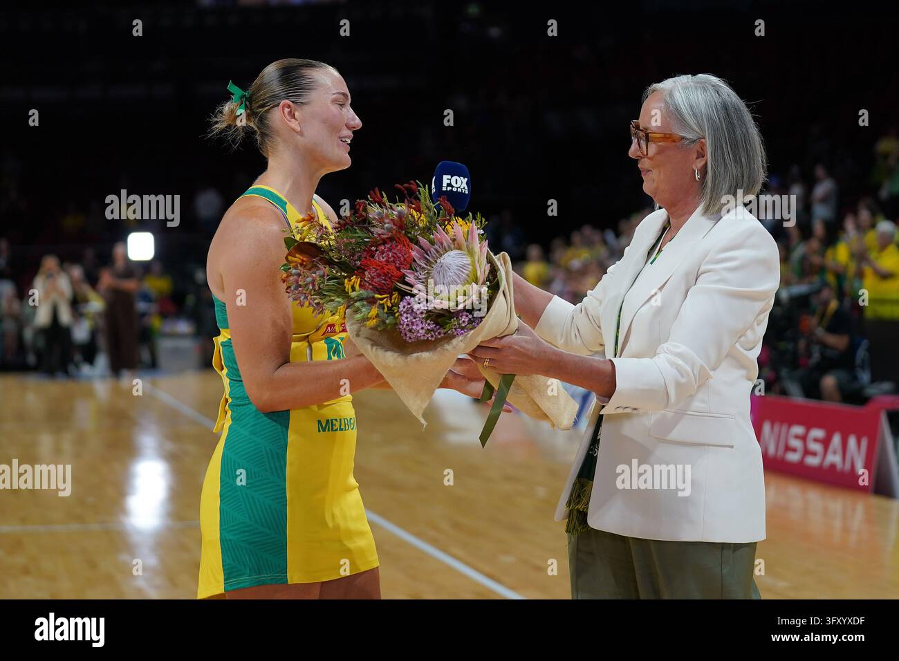 Netball Pic. Vector Courtney Bruce of Australia Diamonds celebrates winning her 100th cap ...