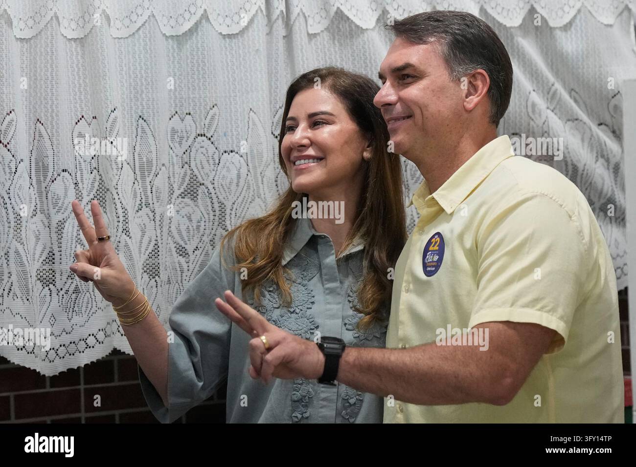 Opposition presidential candidate Sen. Flavio Bolsonaro and his wife ...