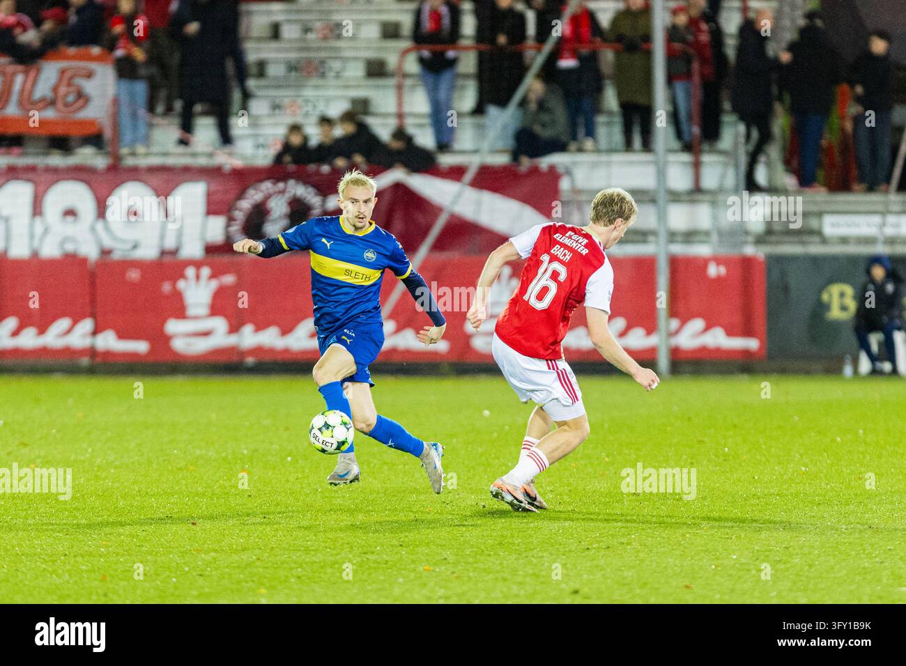 Vejle, Denmark. 24th, October 2026. Magnus Kaastrup (L) of Aarhus ...