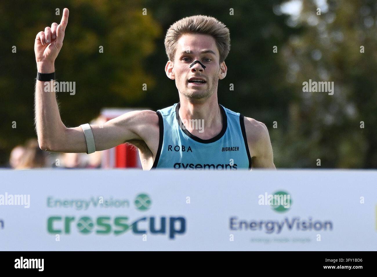 Running Finish Line Vector Belgian Yorick Van De Kerkhove celebrates as he crosses the finish line ...