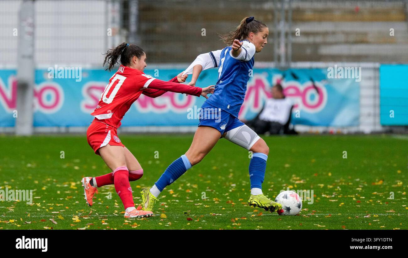 From left: Vital Kats (Mainz, 30), Lisann Kaut (TSG, 4), duel, game ...