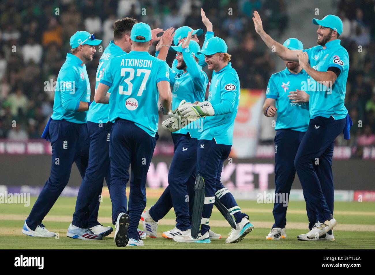 Wikets Vector Players of the England team celebrate the wicket of Pakistan's Saim ...