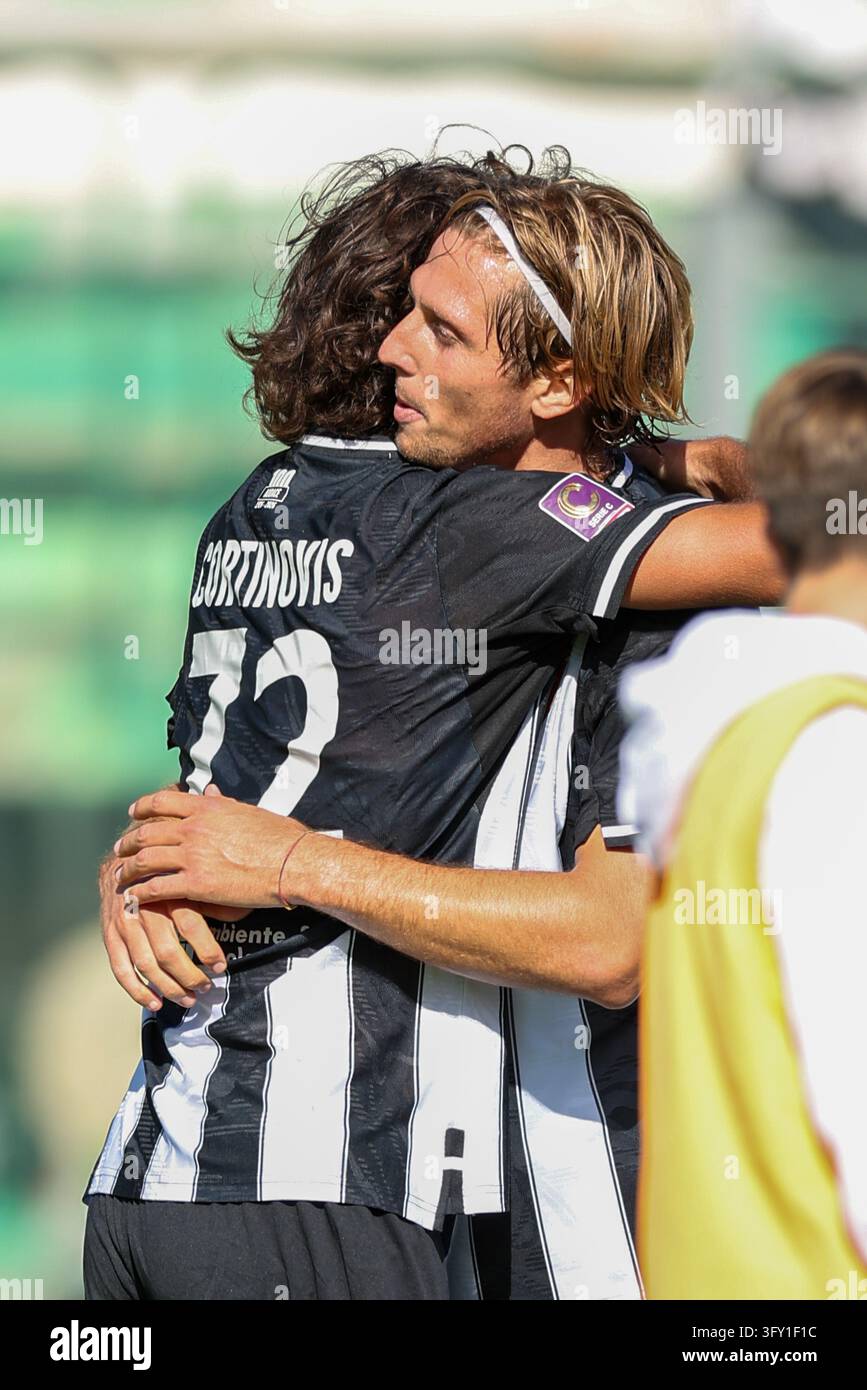 Team Hug Vector IPA90164579 - Alessandro Cortinovis (#72 - SS Monopoli 1966) hugs a ...