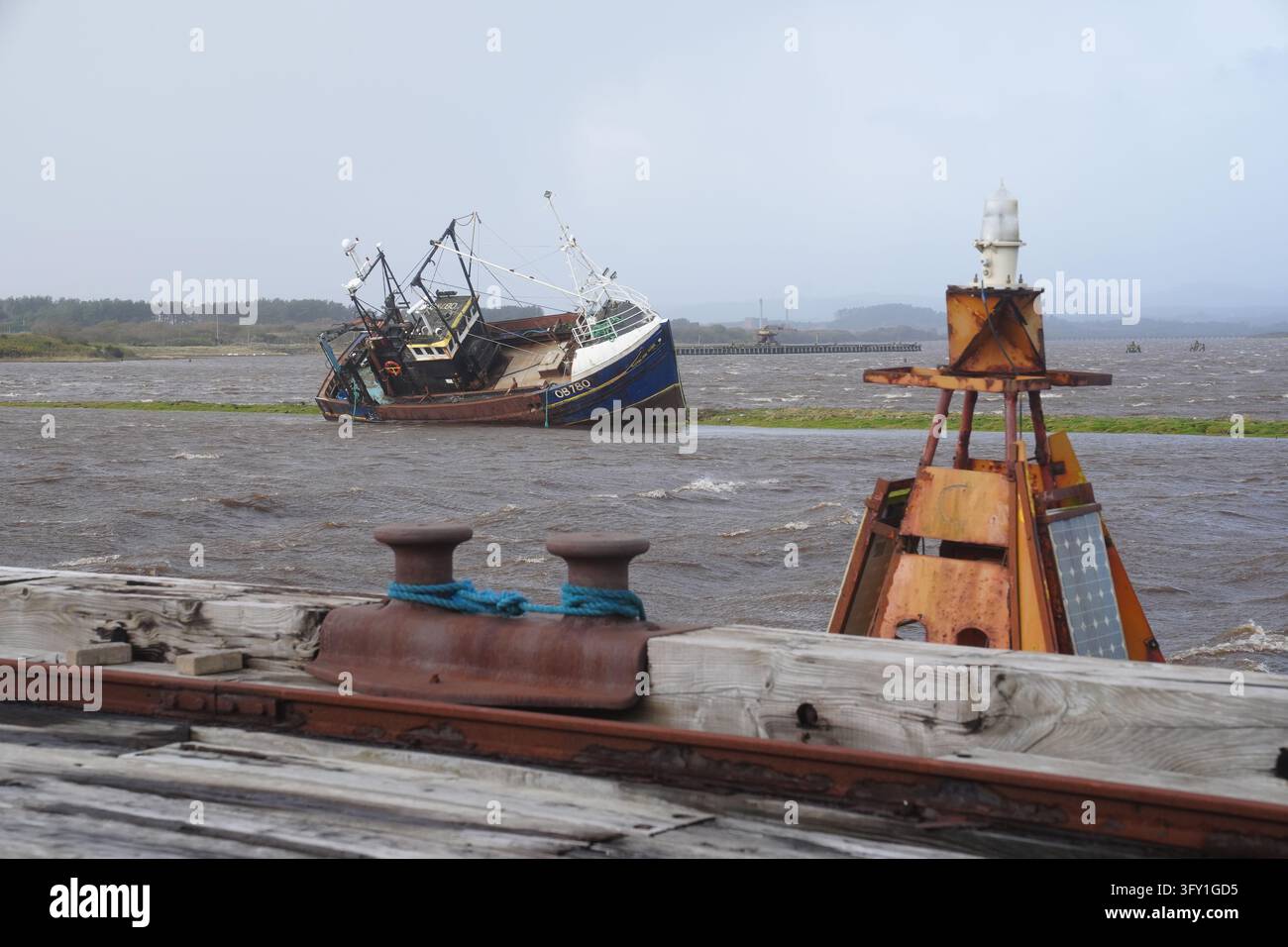 A fishing boat is stranded at Irvine Harbour in Ayrshire after coming ...