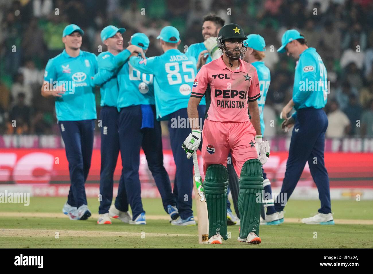 Wikets Vector Pakistan's Arafat Minhas walks off the field after losing his wicket ...
