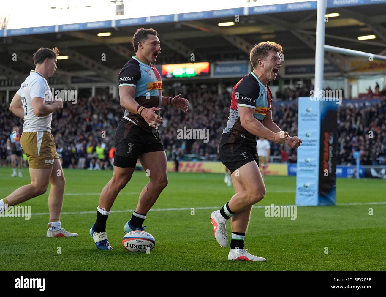 Harlequins' William Porter celebrates scoring a try during the ...