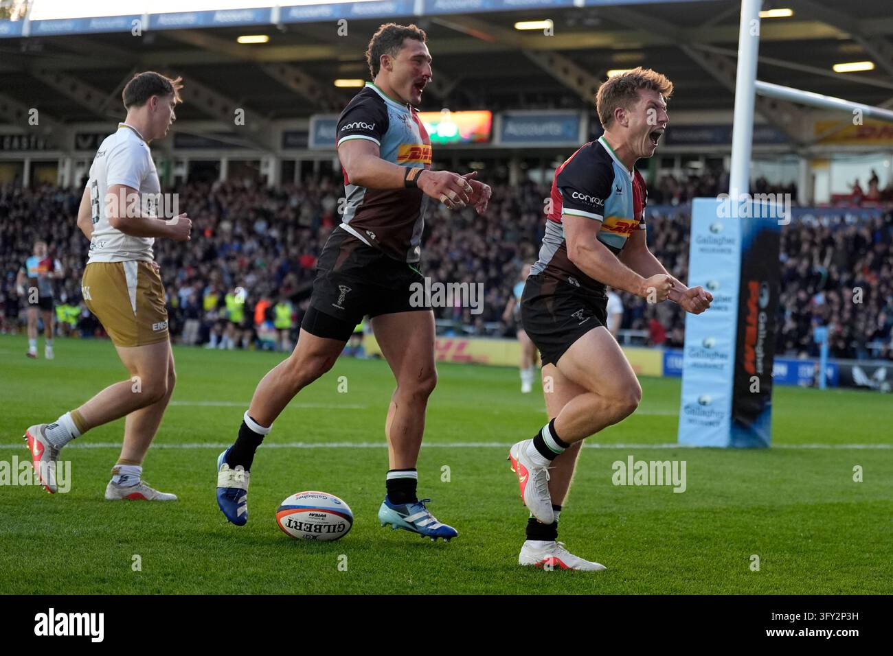 Harlequins' William Porter celebrates scoring a try during the ...