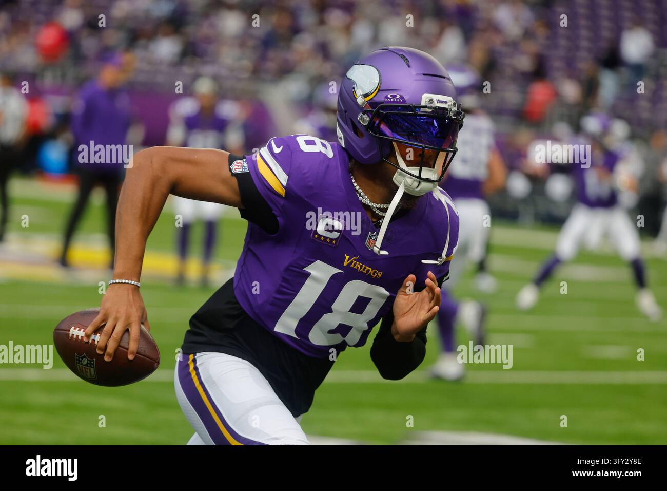 Minnesota Vikings wide receiver Justin Jefferson (18) warms up before ...