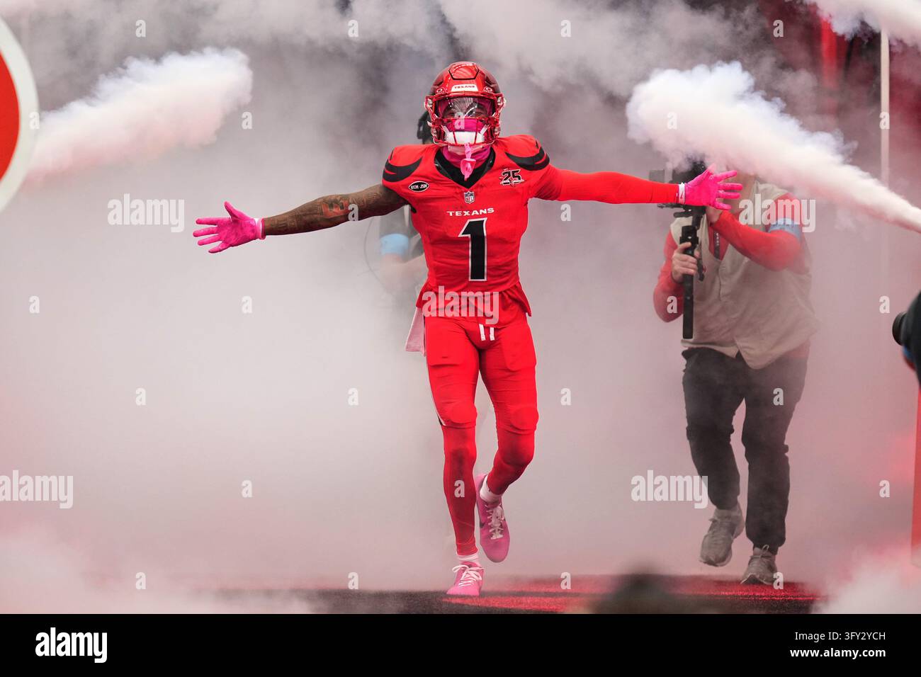 Houston Texans wide receiver Tank Dell (1) is introduced before an NFL ...