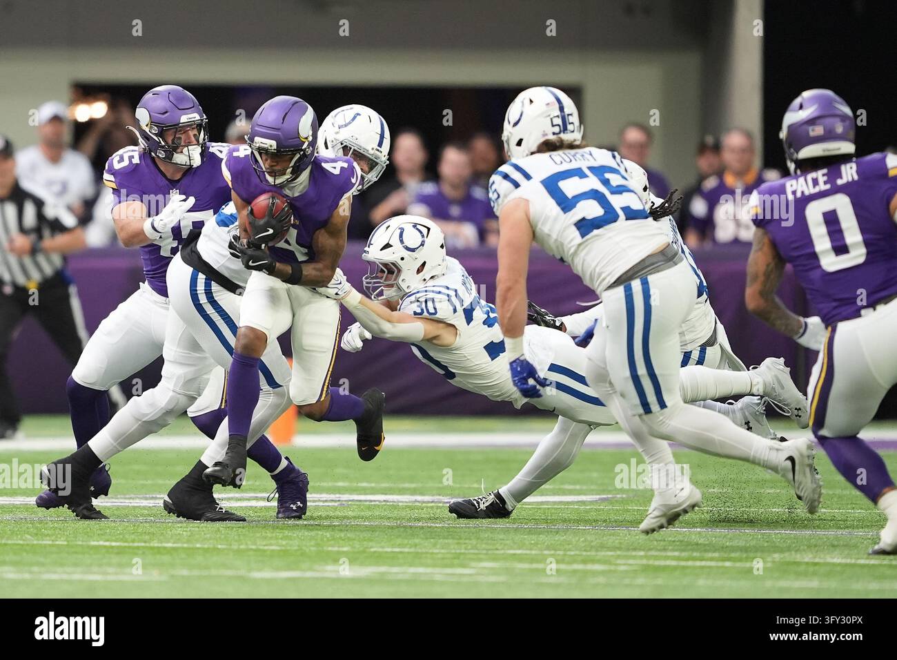 Minnesota Vikings' Myles Price (4) runs against the Indianapolis Colts ...