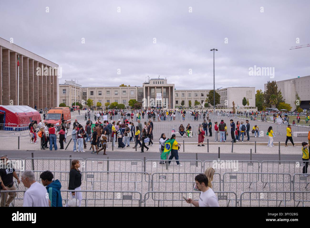 Lisbon, Portugal. 25 October 2026. People move between crowd-control ...