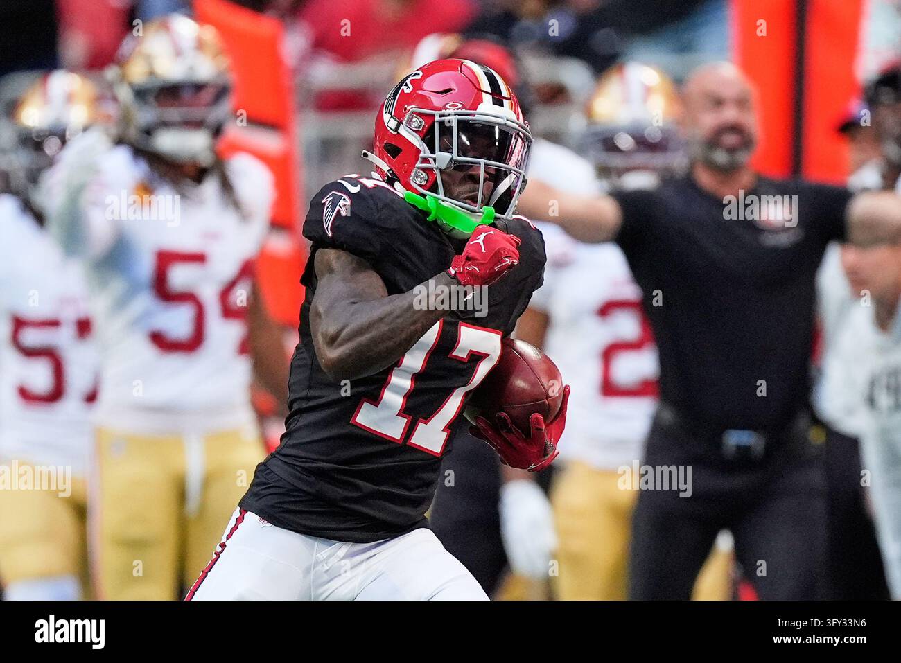 Atlanta Falcons wide receiver Zachariah Branch returns a punt during ...