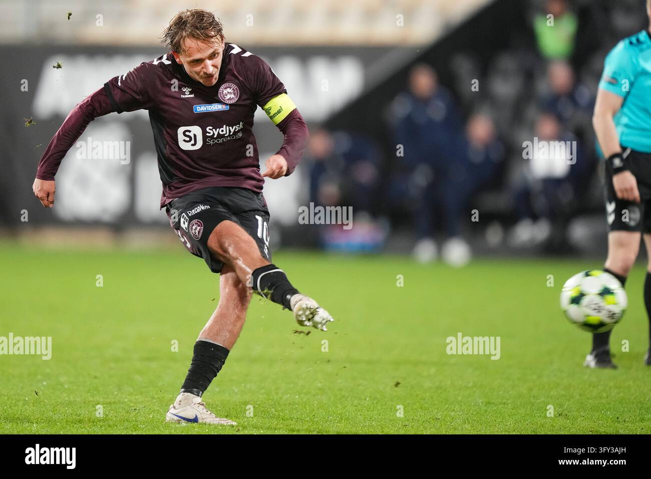 Fisker Sign Mathias Olesen for Soenderjyske during the Superliga match between AC ...