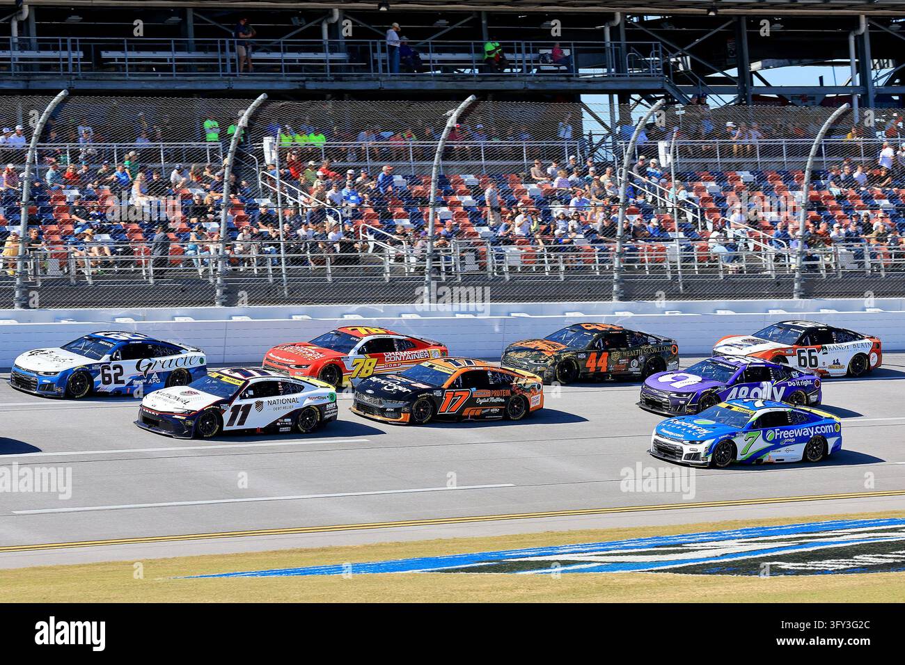 LINCOLN, AL - OCTOBER 25: Tight racing early on during the NASCAR Cup ...