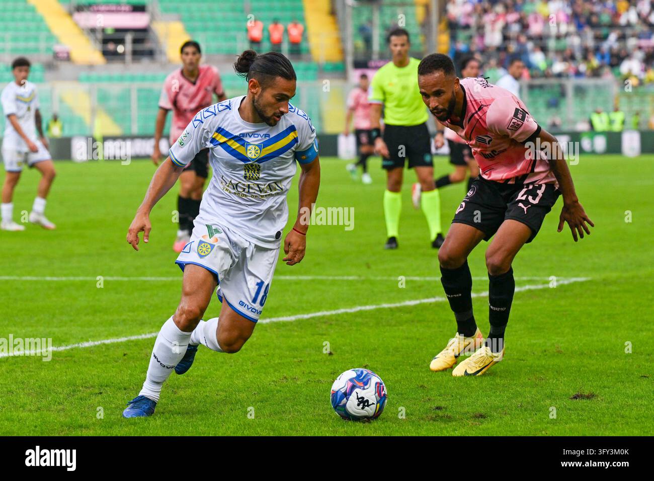 IPA90179261 - Nicolas Schiavi (Carrarese Calcio 1908) in action against ...