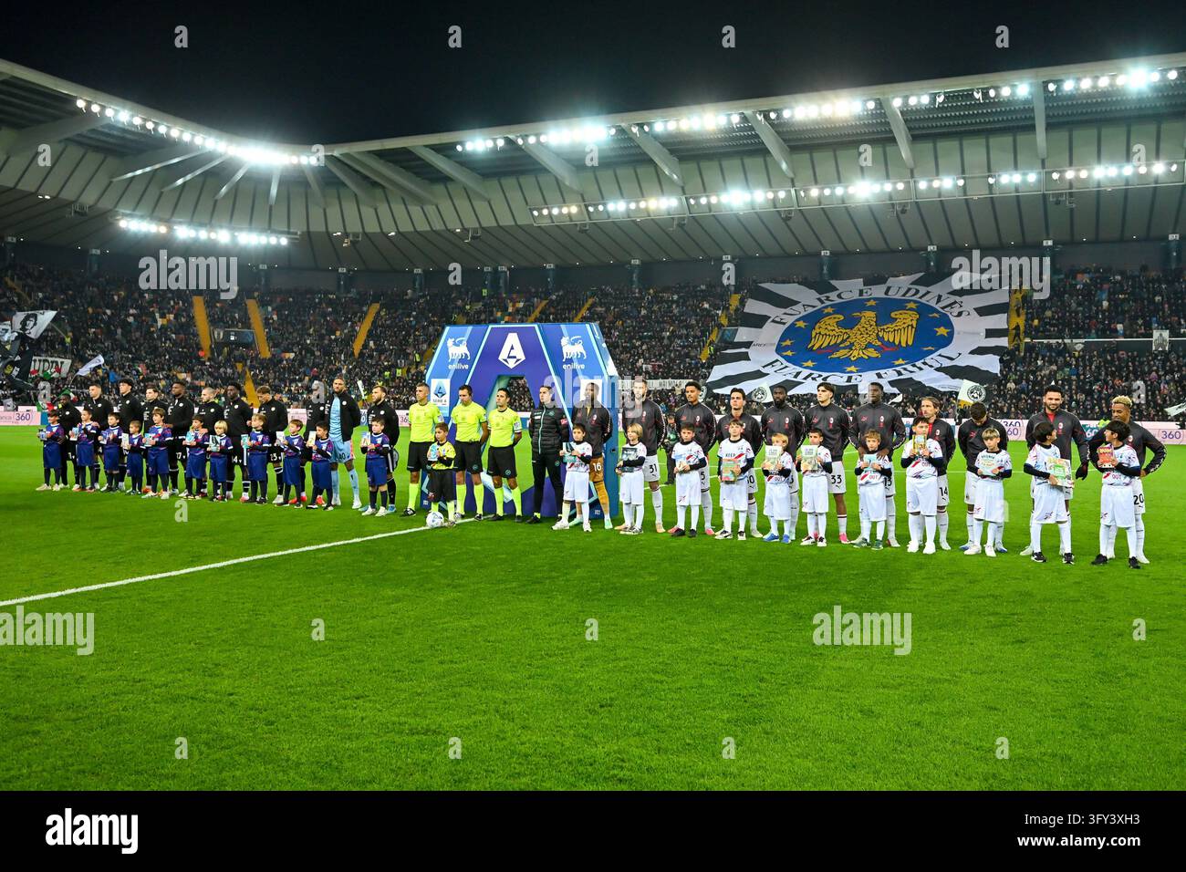 IPA90181181 - AC Milan and Udinese Calcio line up for the Serie A ...