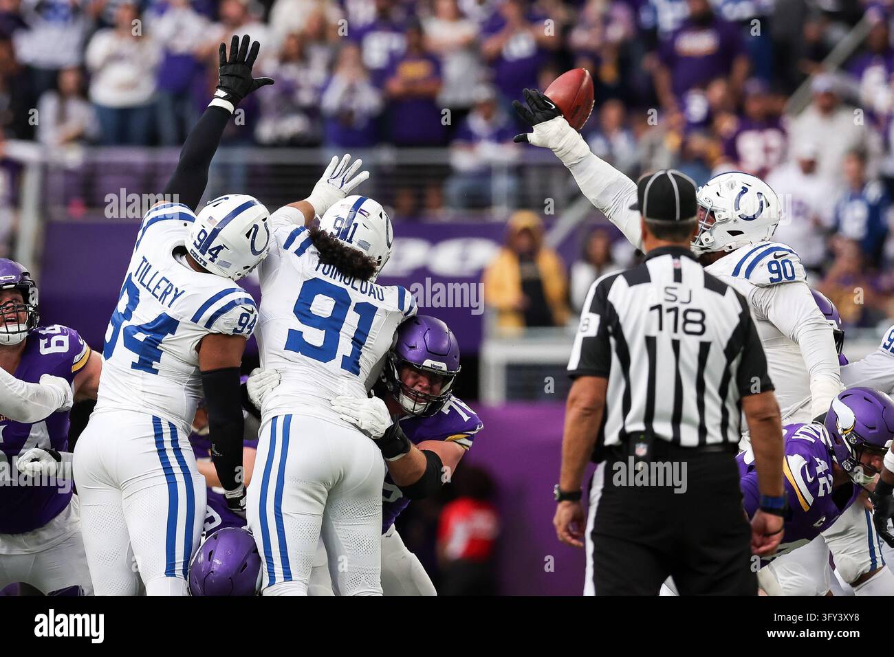 Football Block Image Vector Indianapolis Colts defensive tackle Grover Stewart (90) blocks a field ...