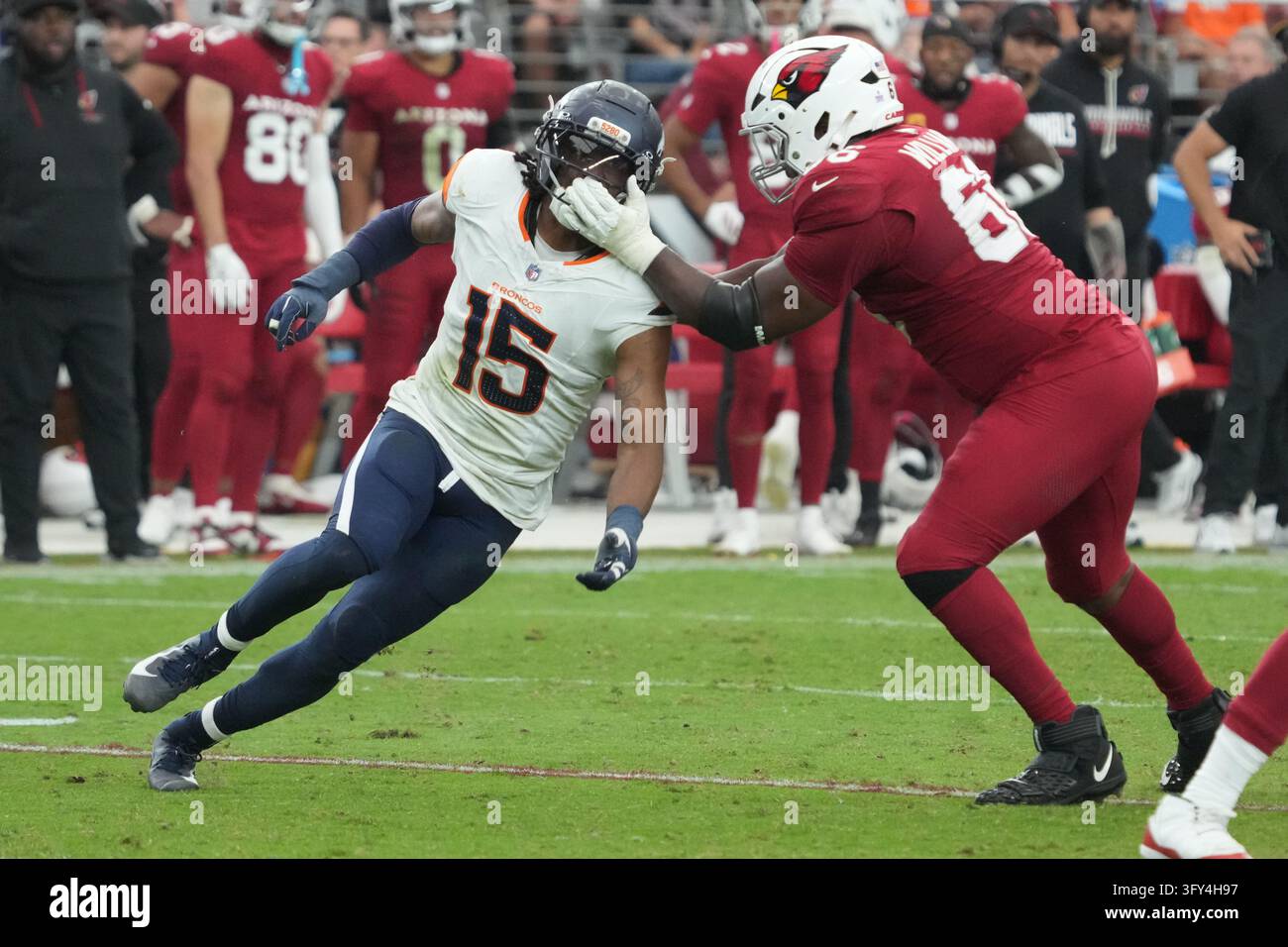 Football Block Image Vector Arizona Cardinals offensive tackle Jayden Williams (66) blocks Denver ...