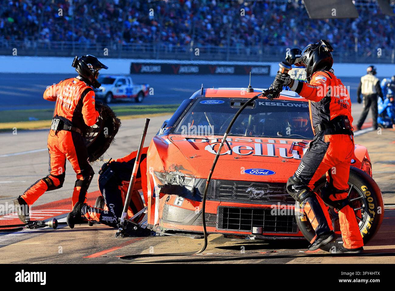 LINCOLN, AL - OCTOBER 25: The crew of Brad Keselowski (#6 RFK Racing ...