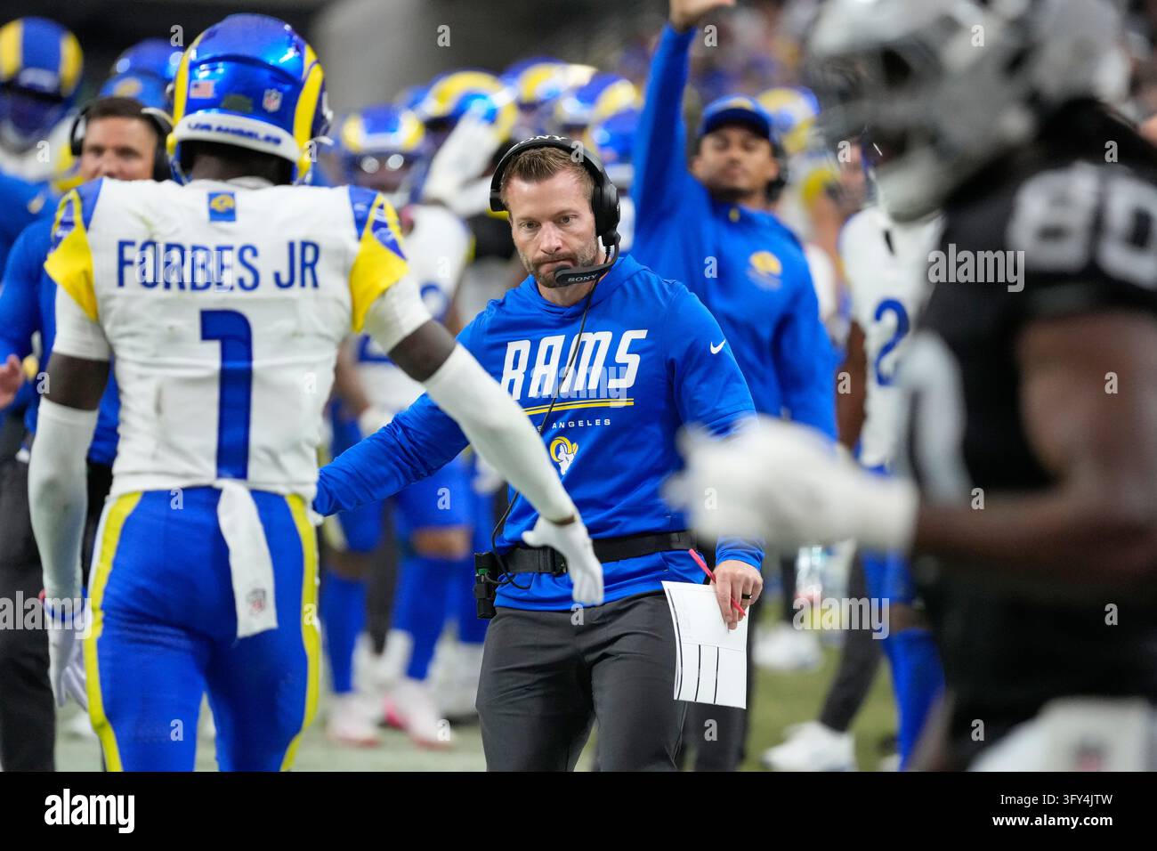 Los Angeles Rams head coach Sean McVay, center, greets cornerback ...