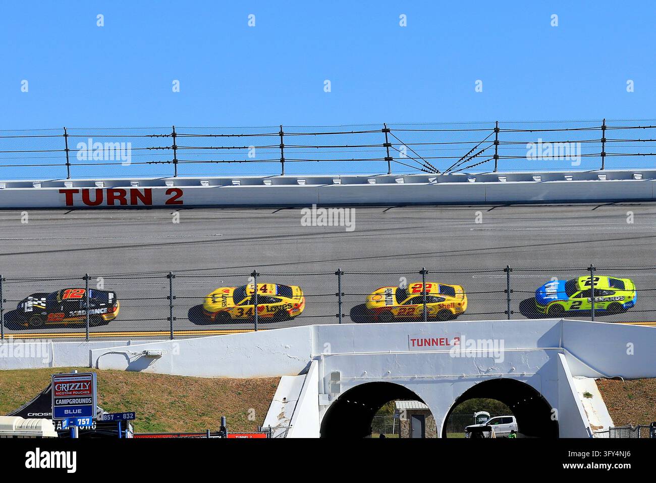 LINCOLN, AL - OCTOBER 25: Cars race over Turn 2 tunnel during the ...
