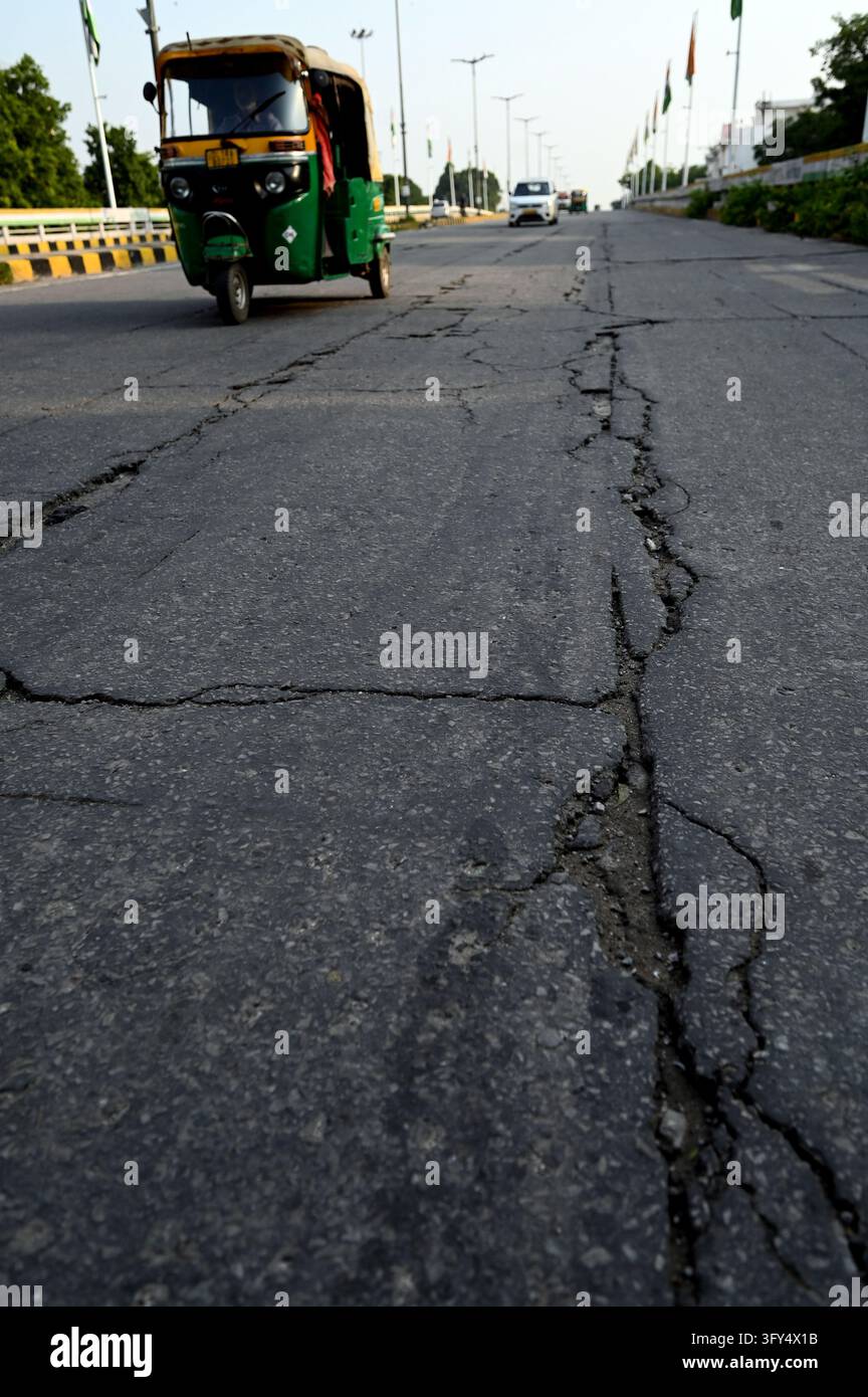 Cracks Rode Picture NEW DELHI, INDIA - OCTOBER 25: A view of cracks and damaged sections of ...