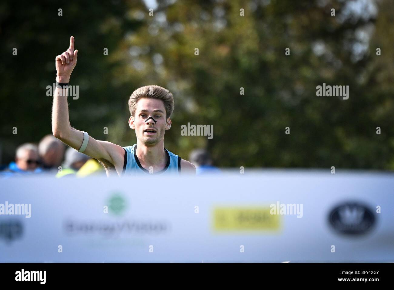 Running Finish Line Vector Belgian Yorick Van De Kerkhove celebrates as he crosses the finish line ...