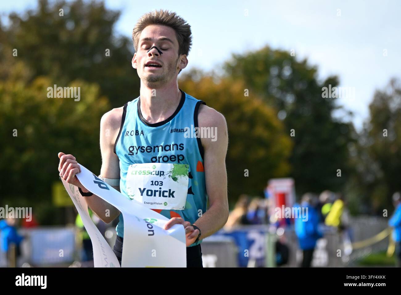 Running Finish Line Vector Belgian Yorick Van De Kerkhove celebrates as he crosses the finish line ...