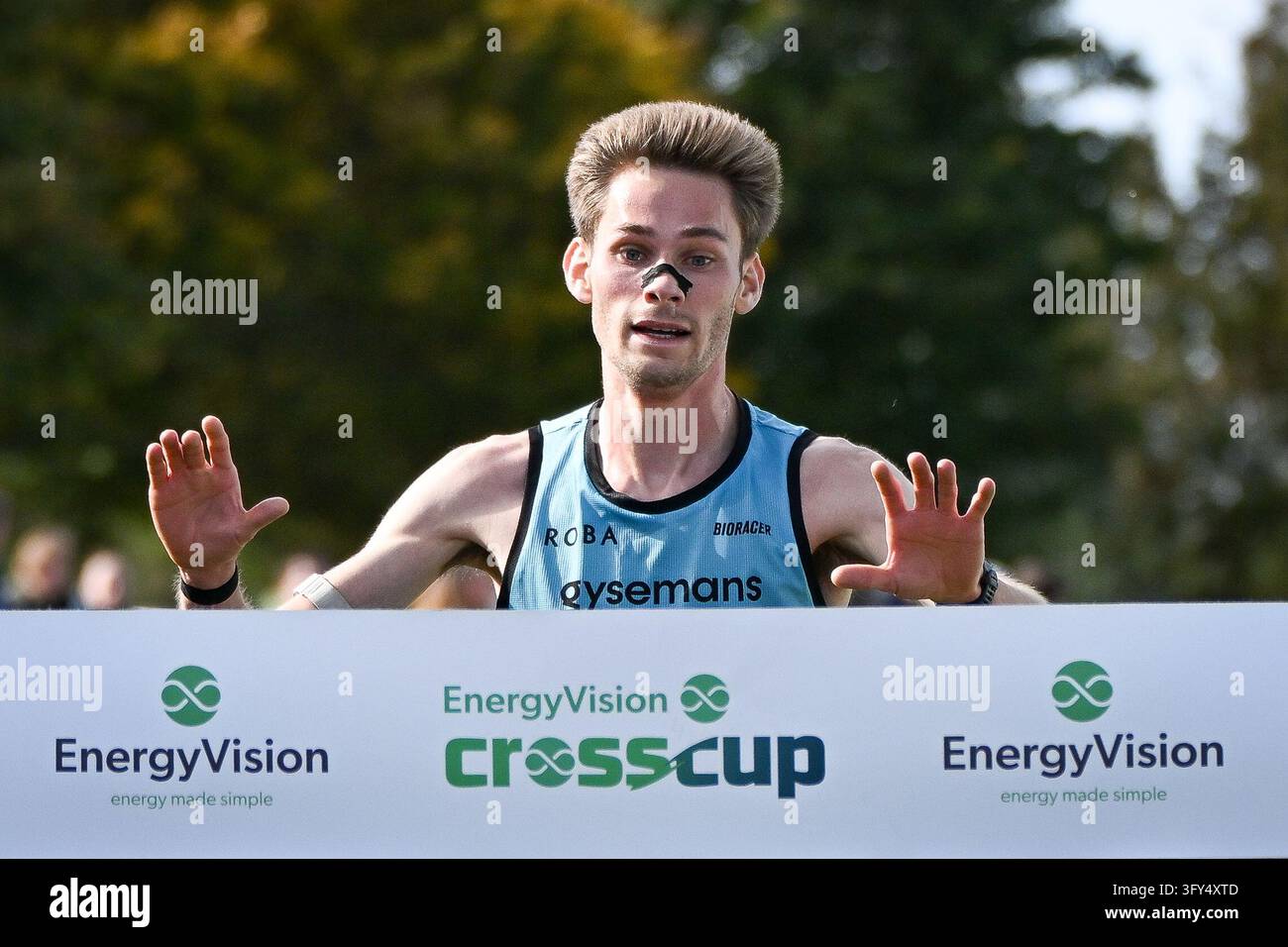 Running Finish Line Vector Belgian Yorick Van De Kerkhove celebrates as he crosses the finish line ...