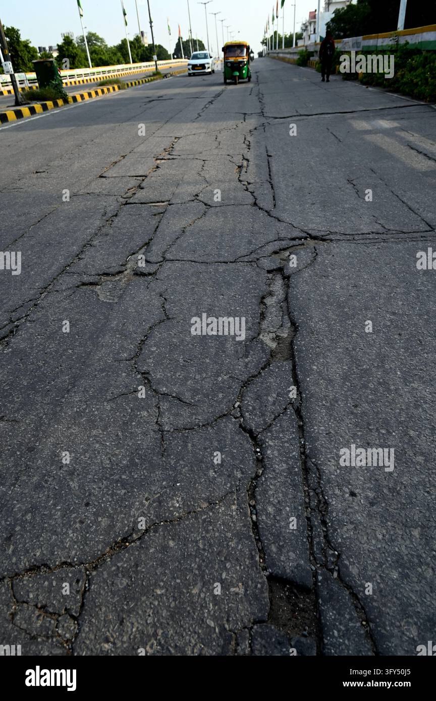 Cracks Rode Picture NEW DELHI, INDIA - OCTOBER 25: A view of cracks and damaged sections of ...