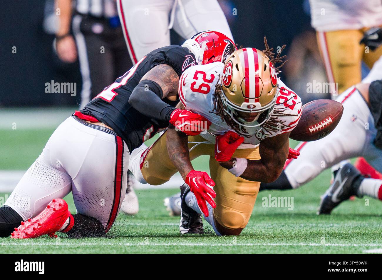 Atlanta Falcons safety Xavier Watts (31) forces a fumble by San ...