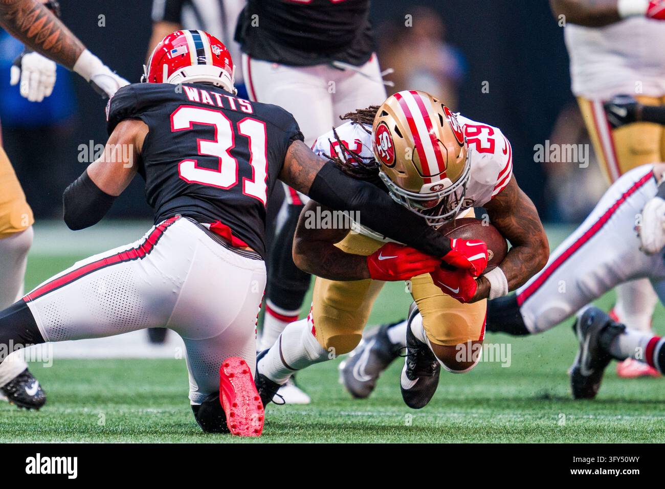 Atlanta Falcons safety Xavier Watts (31) forces a fumble by San ...
