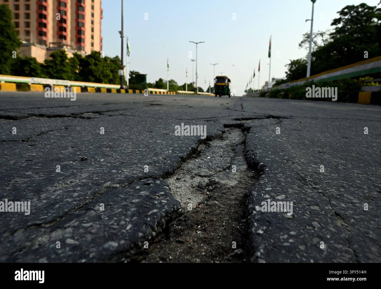 Cracks Rode Picture NEW DELHI, INDIA - OCTOBER 25: A view of cracks and damaged sections of ...