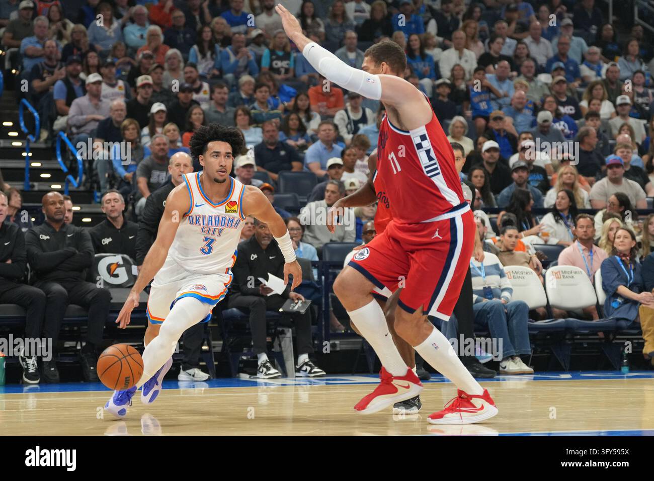 Brook Vector Oklahoma City Thunder guard Jared McCain (3) drives past Los Angeles ...