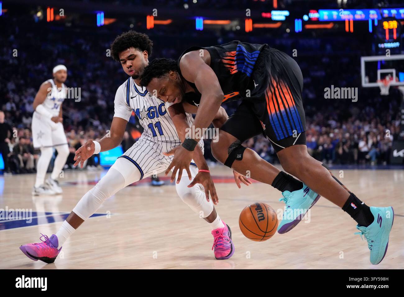 Magic Ball Sticker New York Knicks forward Og Anunoby (8) fights for control of the ball ...