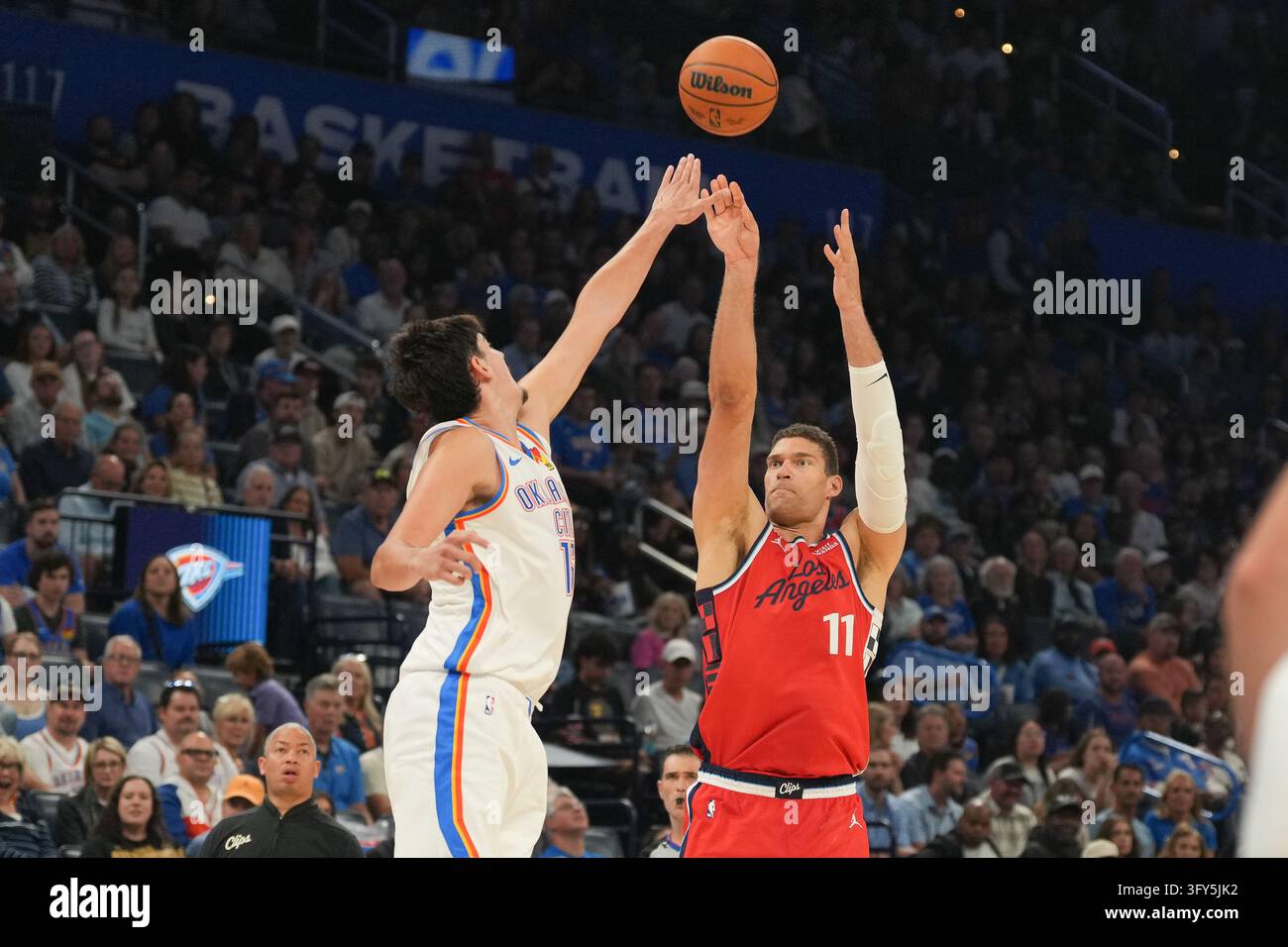 Brook Vector Los Angeles Clippers center Brook Lopez, right, shoots over Oklahoma ...