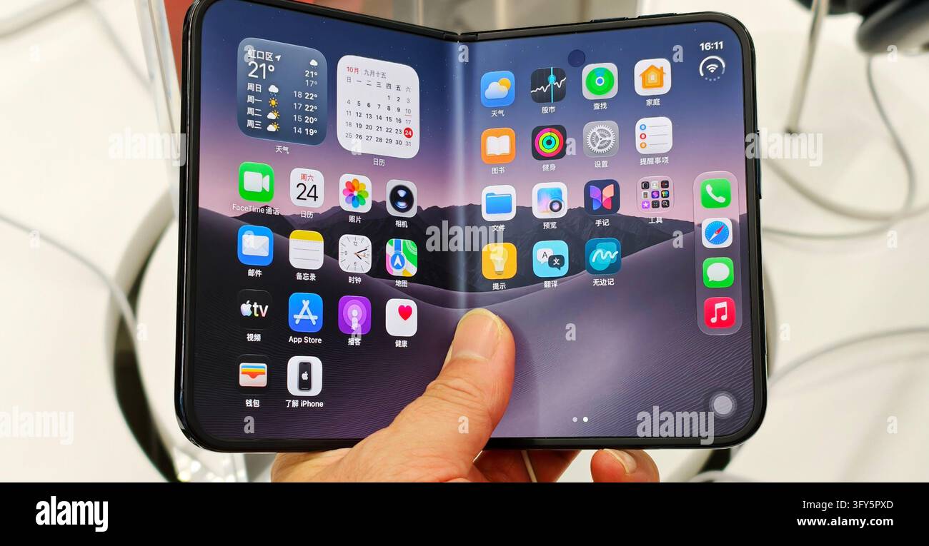 SHANGHAI, CHINA - OCTOBER 24, 2026 - A consumer is experiencing Apple's ...