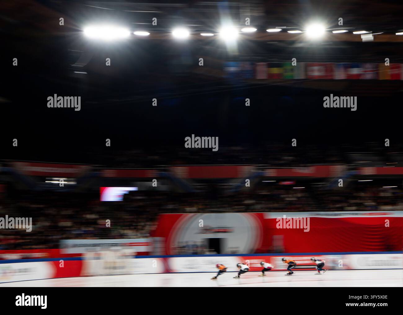 Skaters race during an ISU short track speed skating world tour event ...