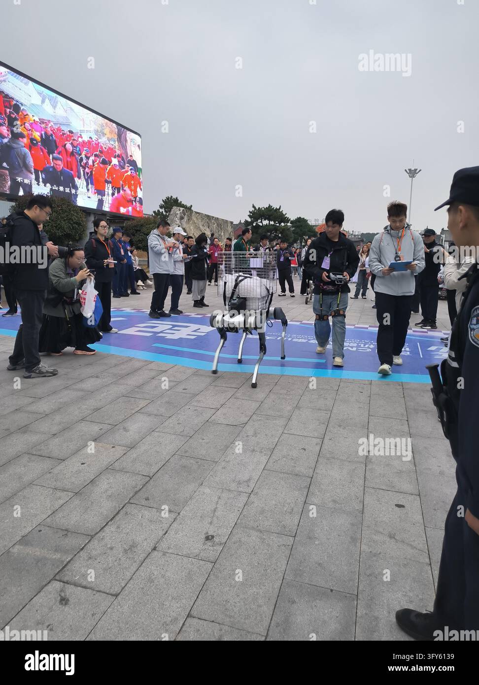 Humanoid and legged robots compete in qualifying rounds for the first ...
