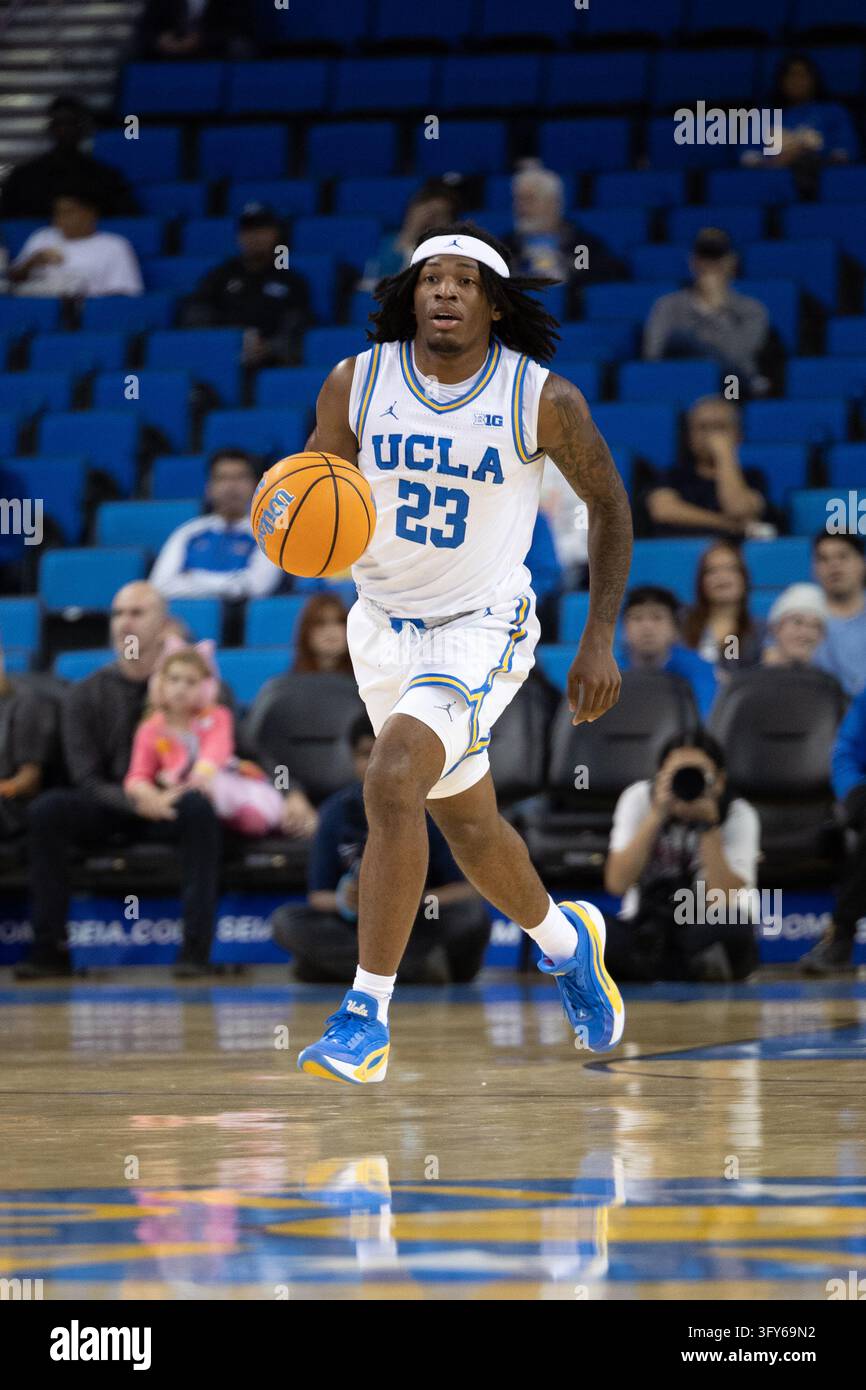LOS ANGELES, CA - OCTOBER 21: Guard Azavier Robinson #23 of the UCLA ...