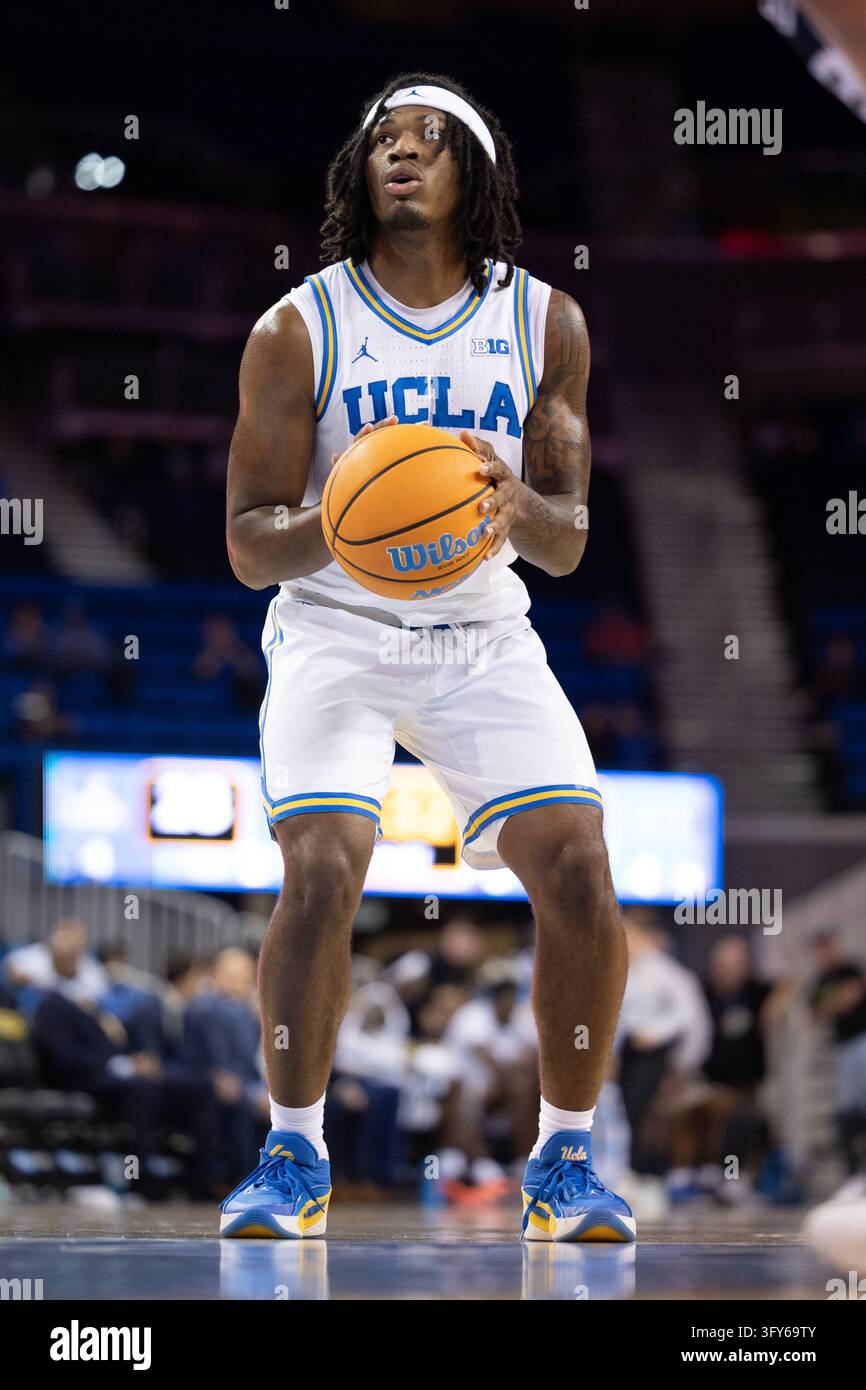 LOS ANGELES, CA - OCTOBER 21: Guard Azavier Robinson #23 of the UCLA ...
