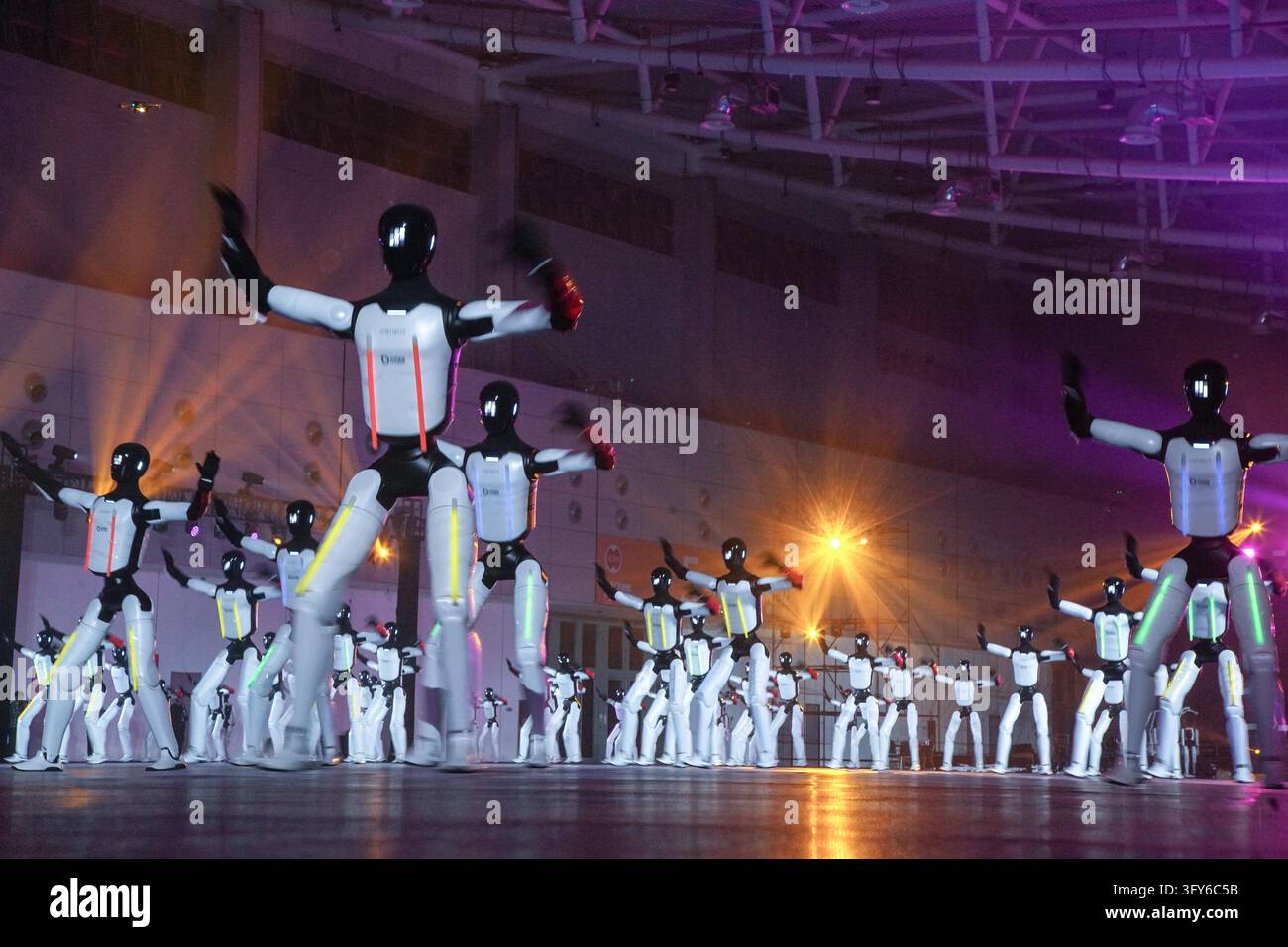 A total of 110 domestically produced humanoid robots danced in unison ...