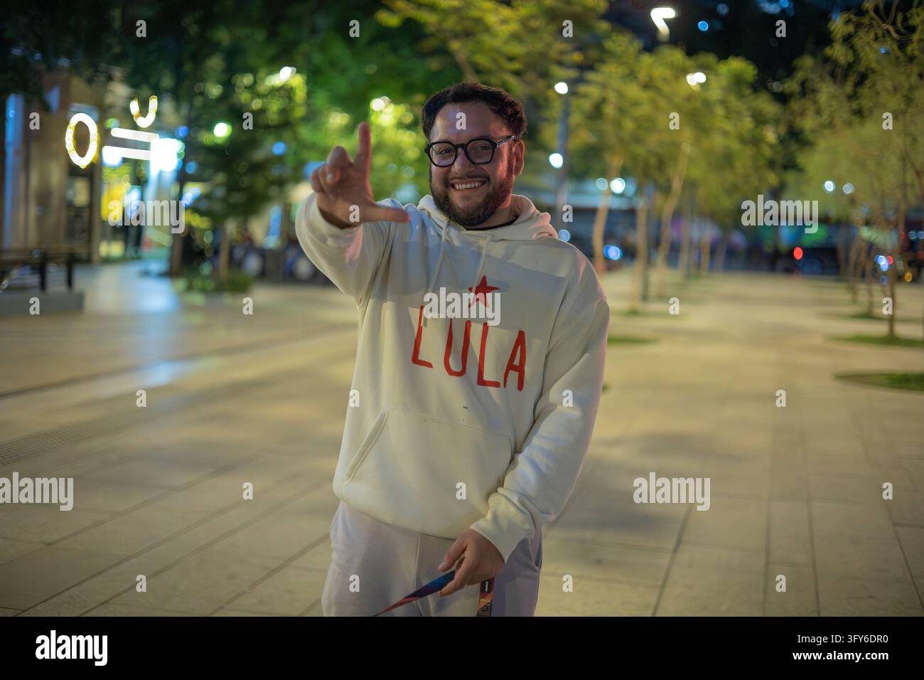 For President Vector A man makes a L for Lula da Silva. Brazilians and Chileans arrived at ...