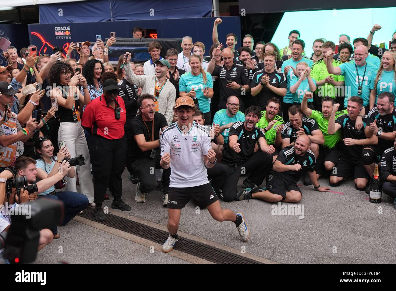 Mercedes driver Andrea Kimi Antonelli of Italy, center, celebrates ...