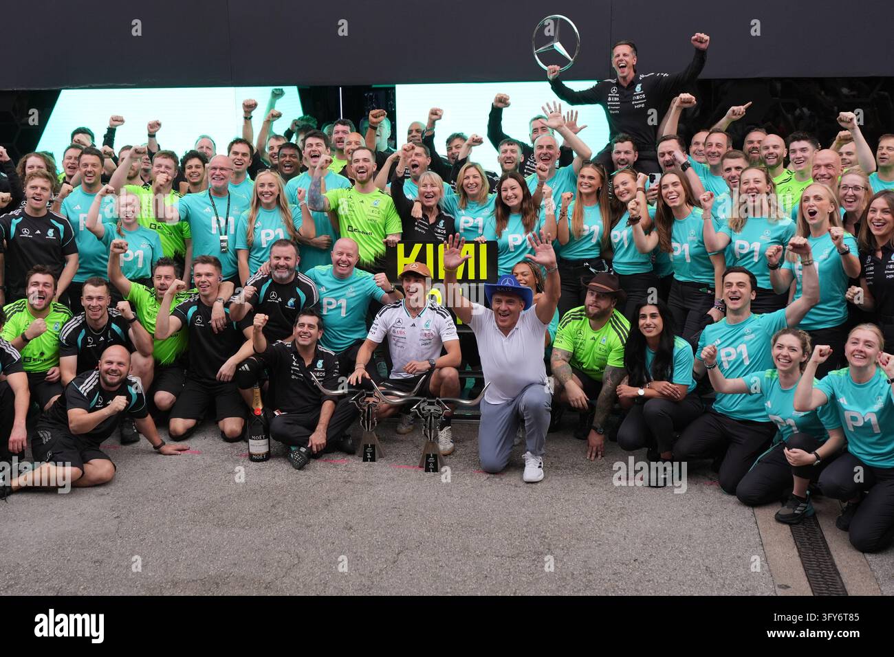Mercedes driver Andrea Kimi Antonelli of Italy, center, celebrates ...