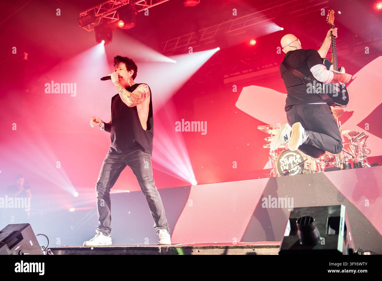 Simple Communiations Plan Image IPA90203932 - Pierre Bouvier and Jeff Stinco of Simple Plan during the ...