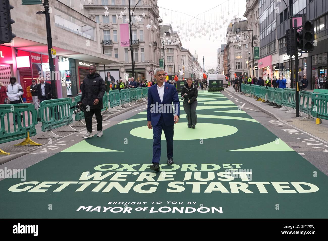 The Mayor of London, Sadiq Khan walks along Oxford Street as it becomes ...