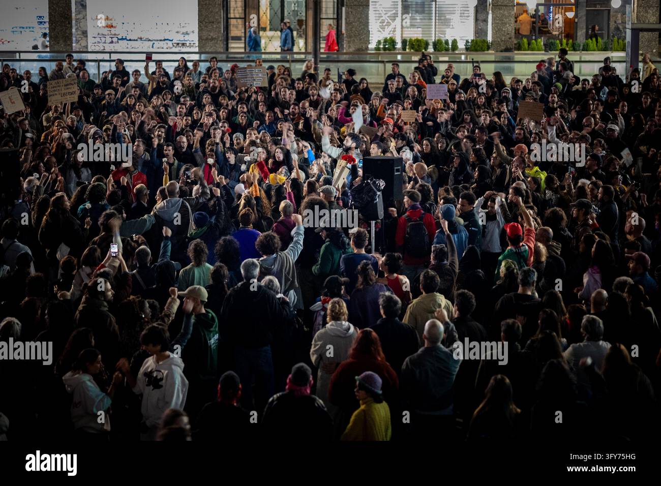 Model Crowd A large crowd gathers at Praça D. João I during a housing rights ...