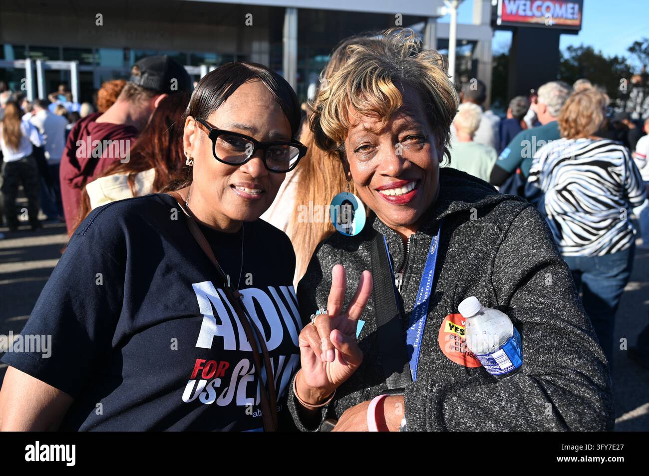 For President Vector Voters Darlene and Aarolyn waiting in line for a rally featuring ...